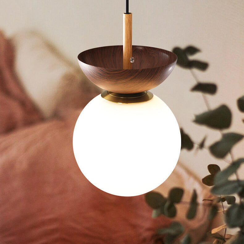 Glass orb light on ceiling