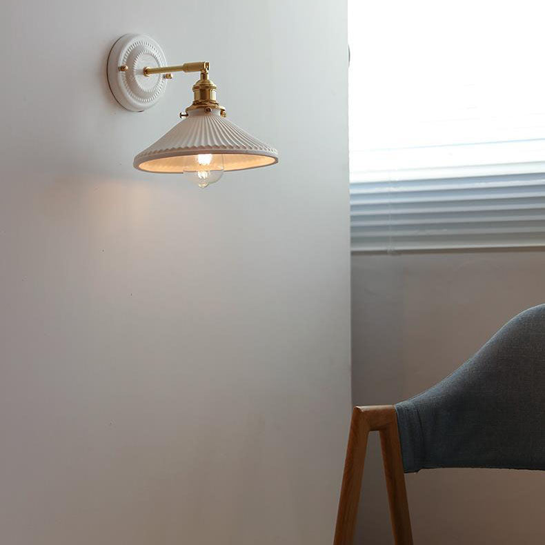 Ceramic wall light lit