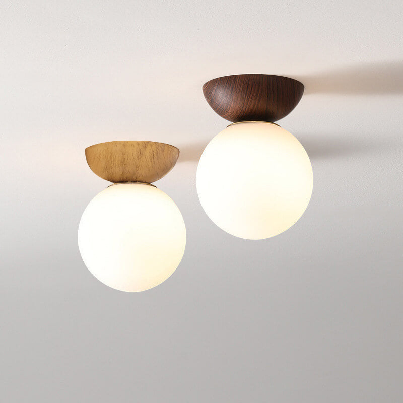 Glass orb light in a corridor
