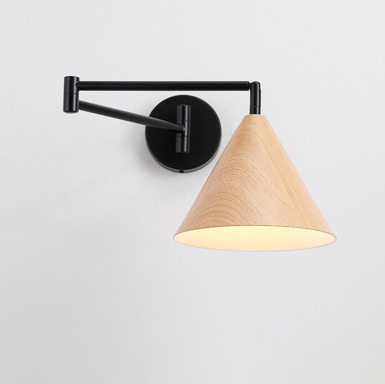 Cone swing arm wall light on bedroom wall