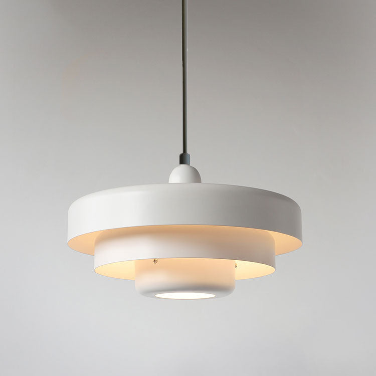 White layered pendant with black cord