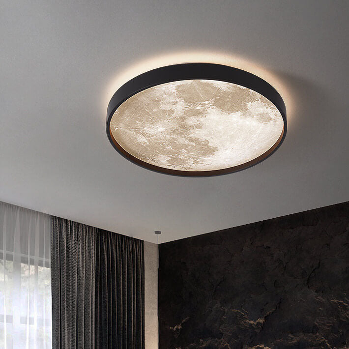Black moon ceiling light on ceiling