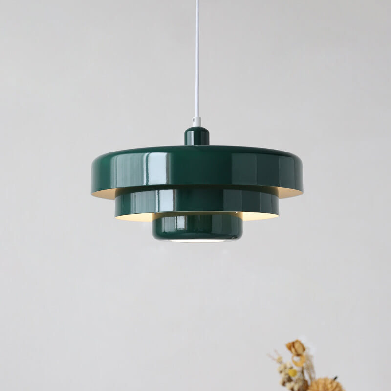 Layered pendant light in a dining room