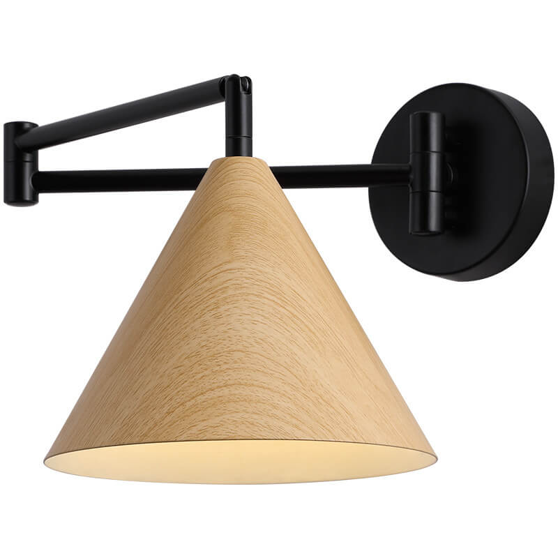 Cone swing arm wall light lit at night