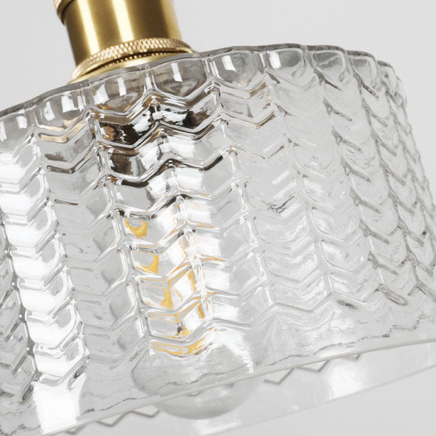Glass jar pendant lit at night