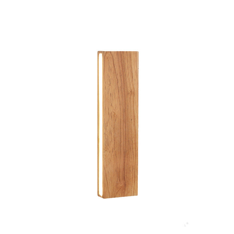Wood wall light mounted above a sofa
