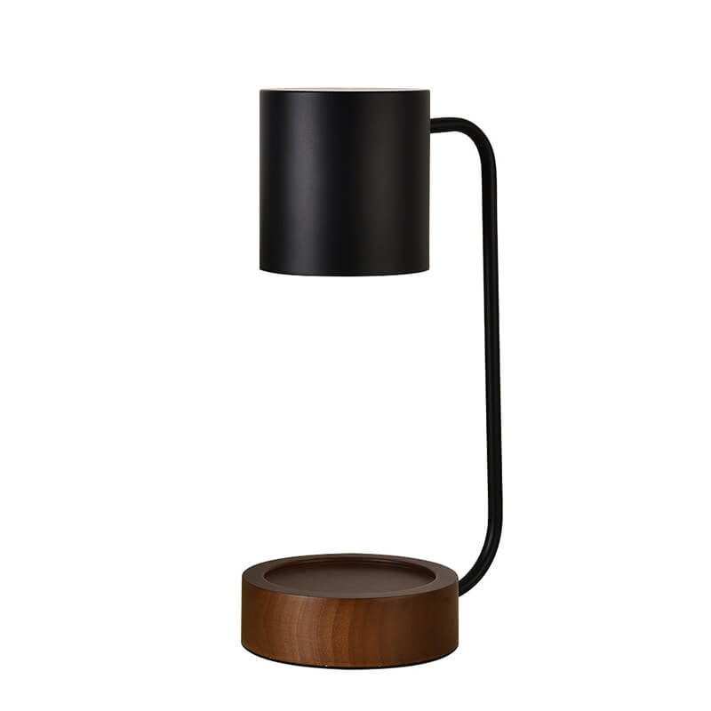 White candle warmer lamp lit