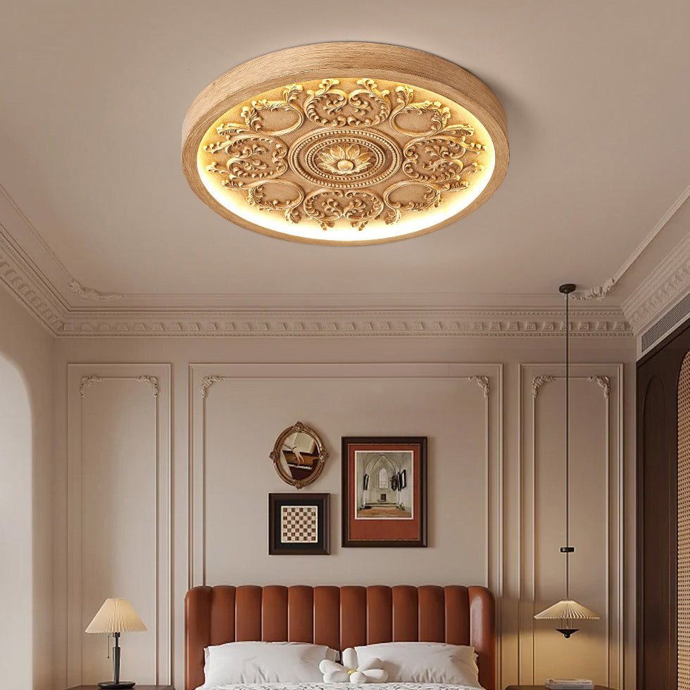 Carved resin flush ceiling light detail