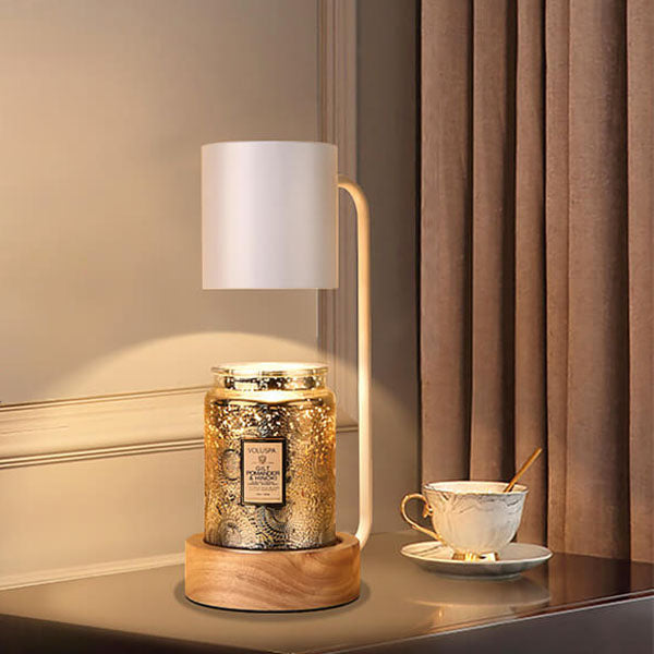 Black candle warmer lamp lit