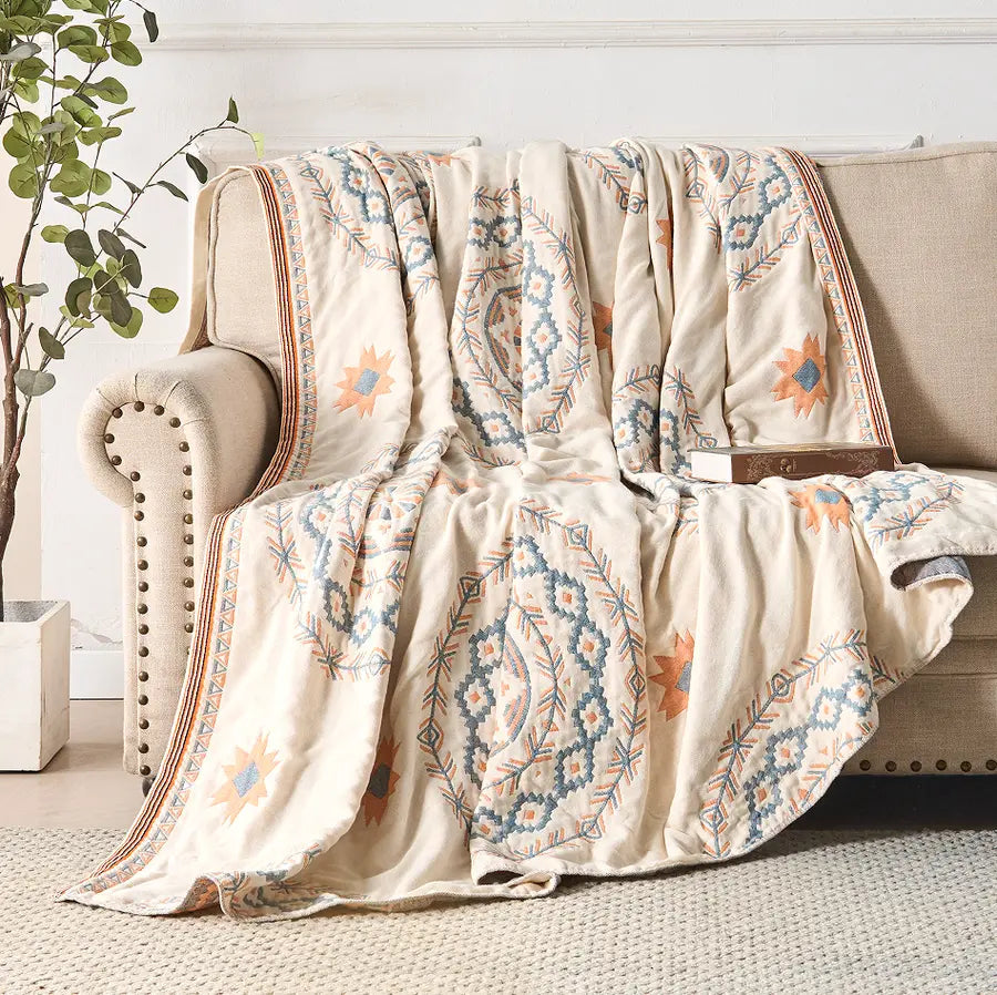 Boho cotton gauze bedspread on a bed