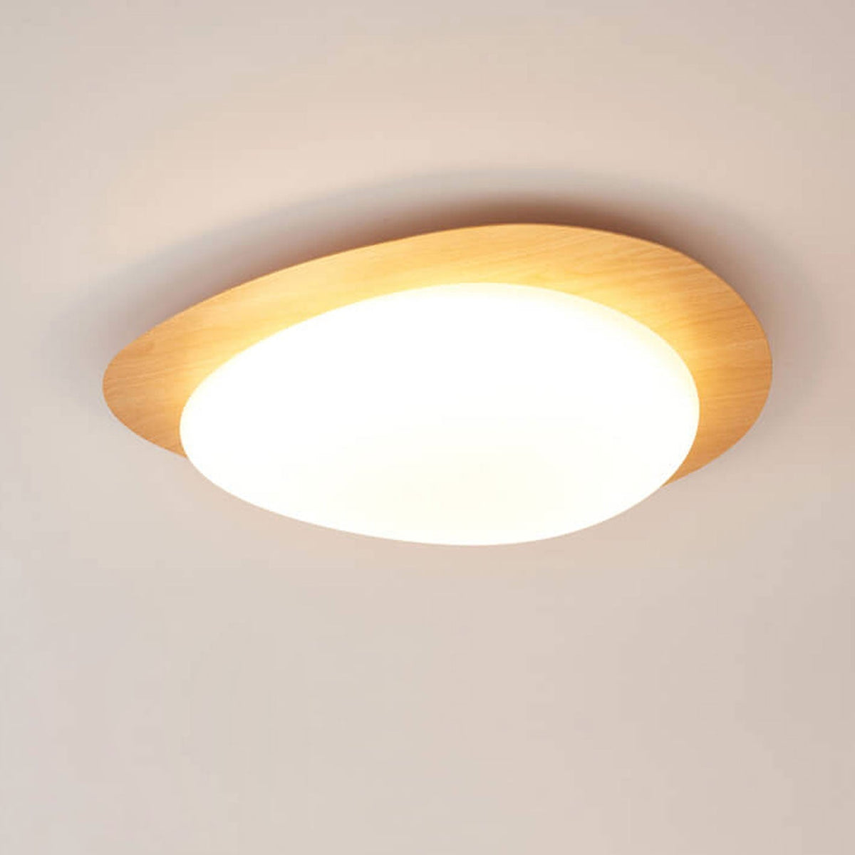 Pebble ceiling light in wood grain