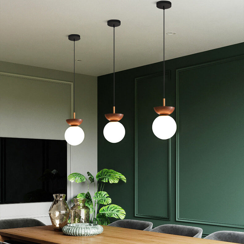 Glass orb light in a bedroom