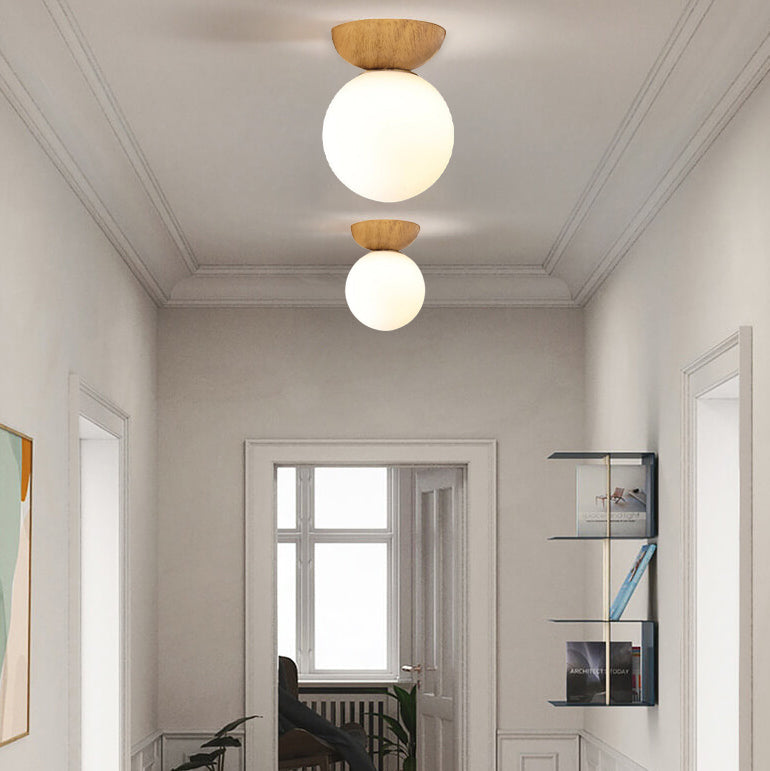 Glass orb light in a hallway