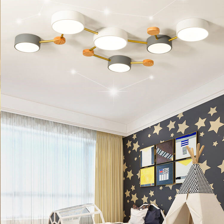 Scandinavian wood and iron LED flush ceiling light in a living room