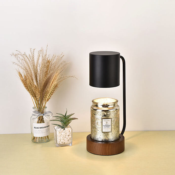 Candle warmer lamp on a desk