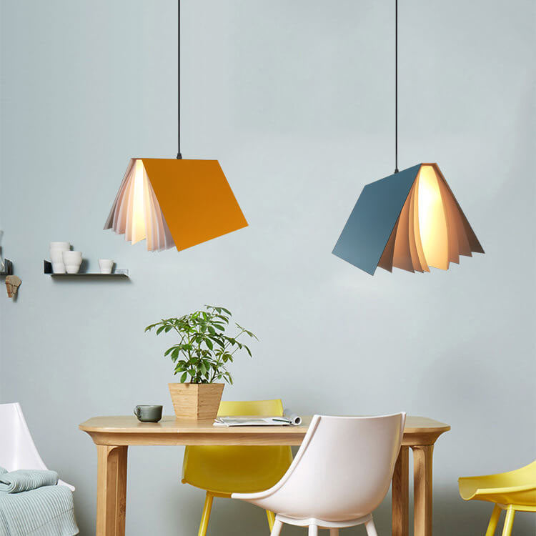 Flying book pendant light in a room