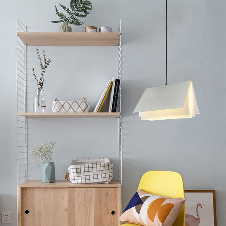 Flying book pendant light in a room