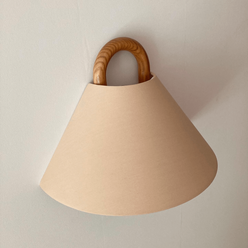 Flat wall light lit