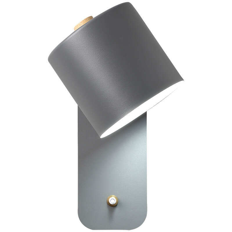 Cylinder wall light in a bedroom