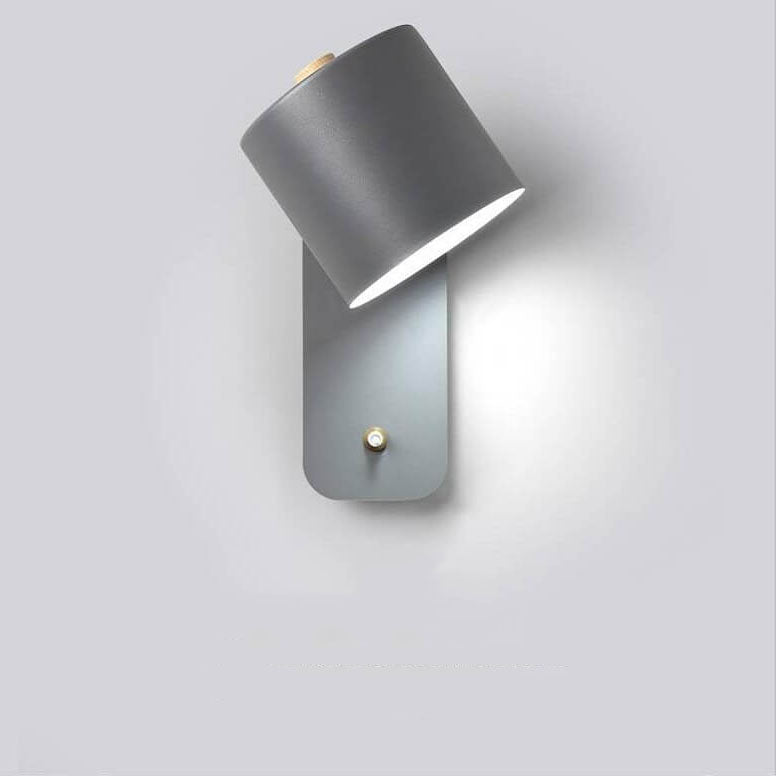 Grey cylinder wall light on wall