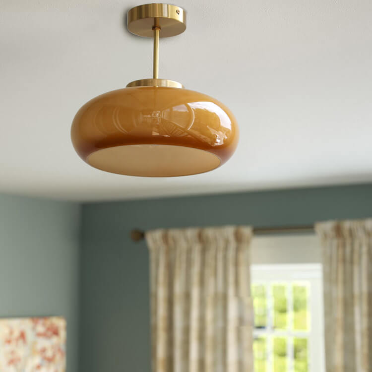 Vintage amber glass ceiling light in brass