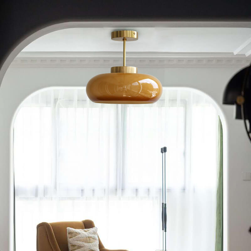 Vintage amber glass ceiling light in brass, front