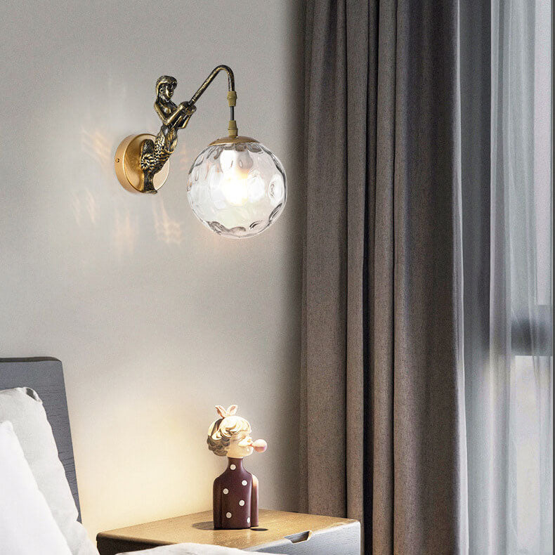 Mermaid wall light figure close-up