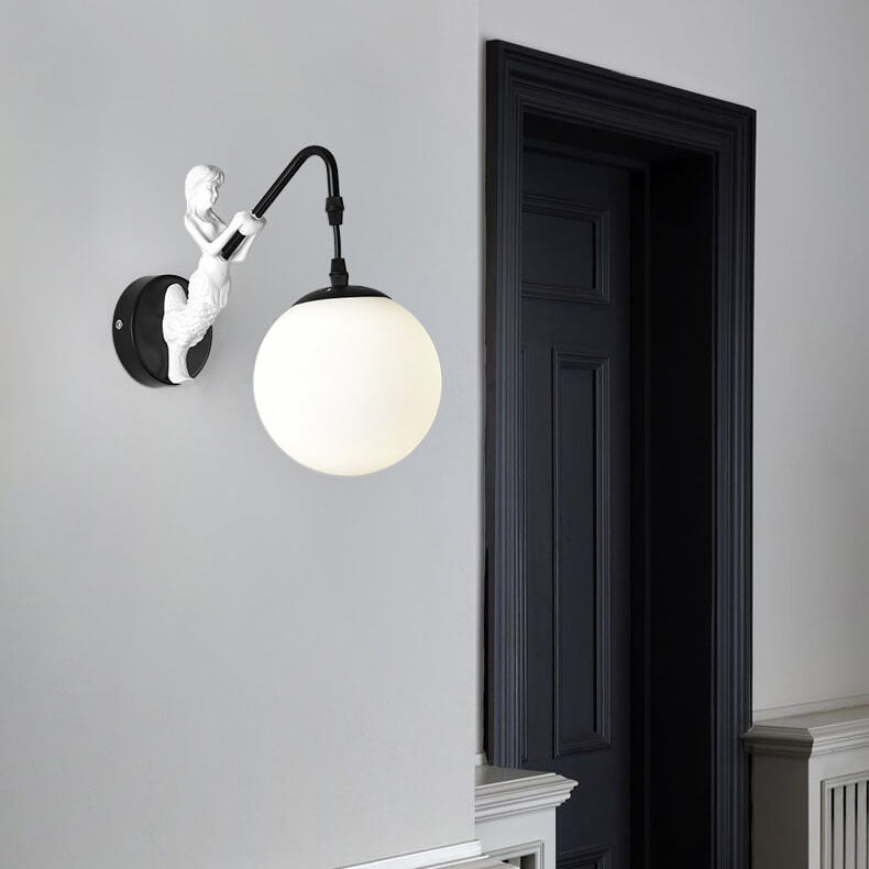 Black mermaid wall light, white orb