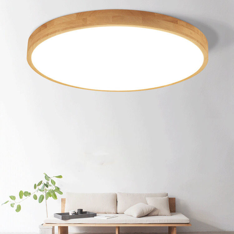 Round wood ceiling light in a living room