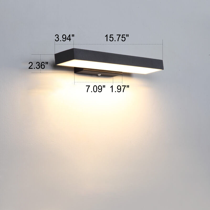 Outdoor wall light by an entrance