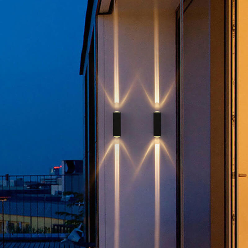 Black rectangular LED outdoor wall light on a wall