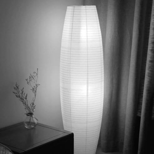Rice paper floor lamp in a bedroom