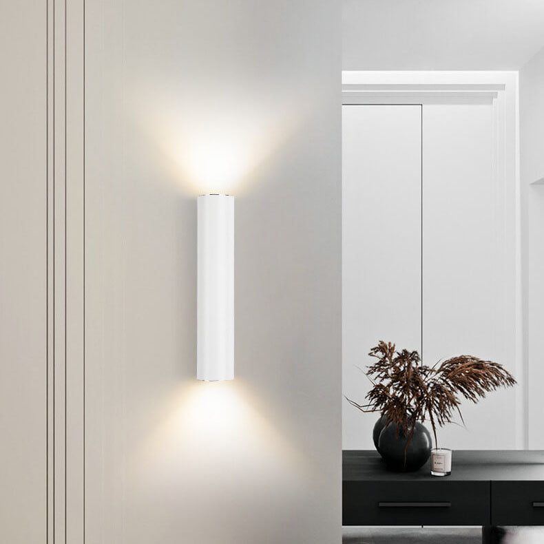 White cylinder wall light, warm white