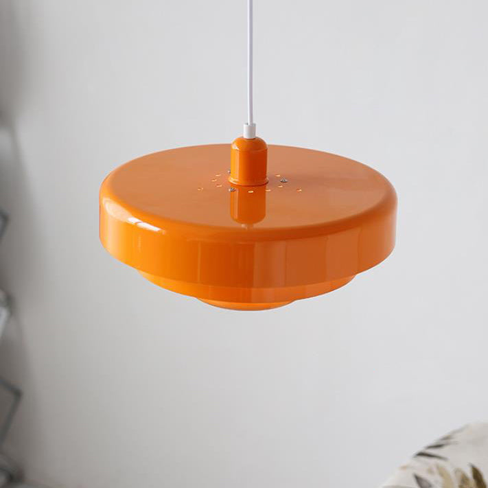 Layered pendant light over a table