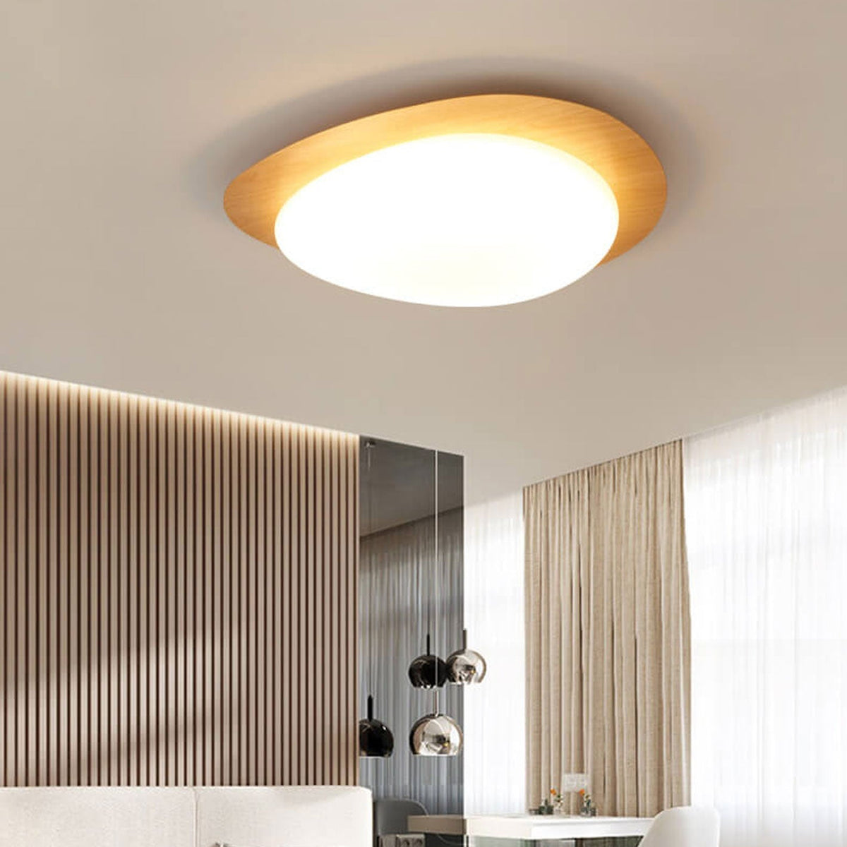 Pebble ceiling light wood rim close-up