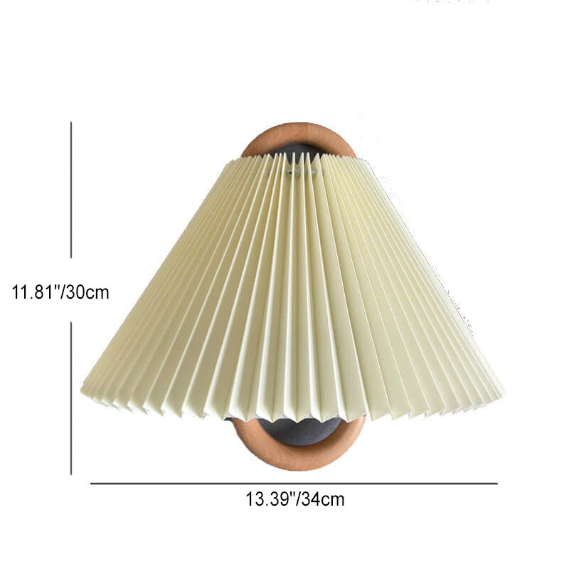 Half-moon wall light beside a bed