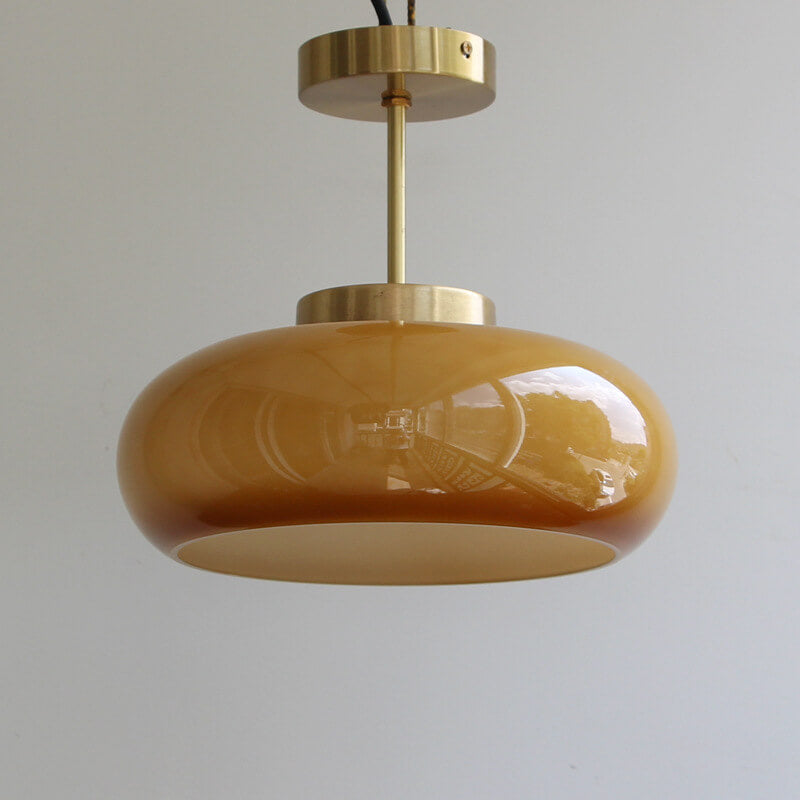 Amber glass ceiling light in a hallway