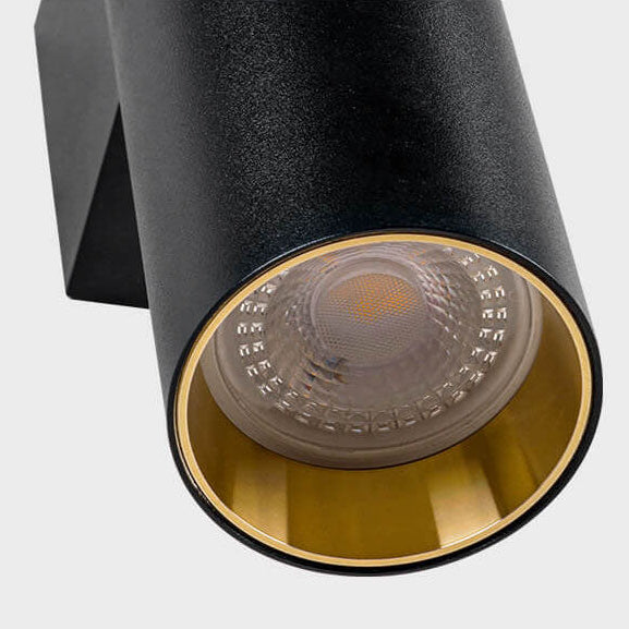 Cylinder wall light in a living room