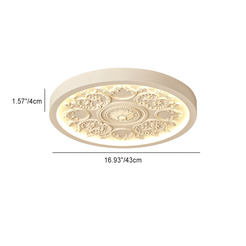 Carved resin flush ceiling light lit