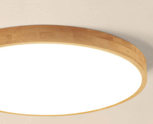 Round wood ceiling light in a bedroom