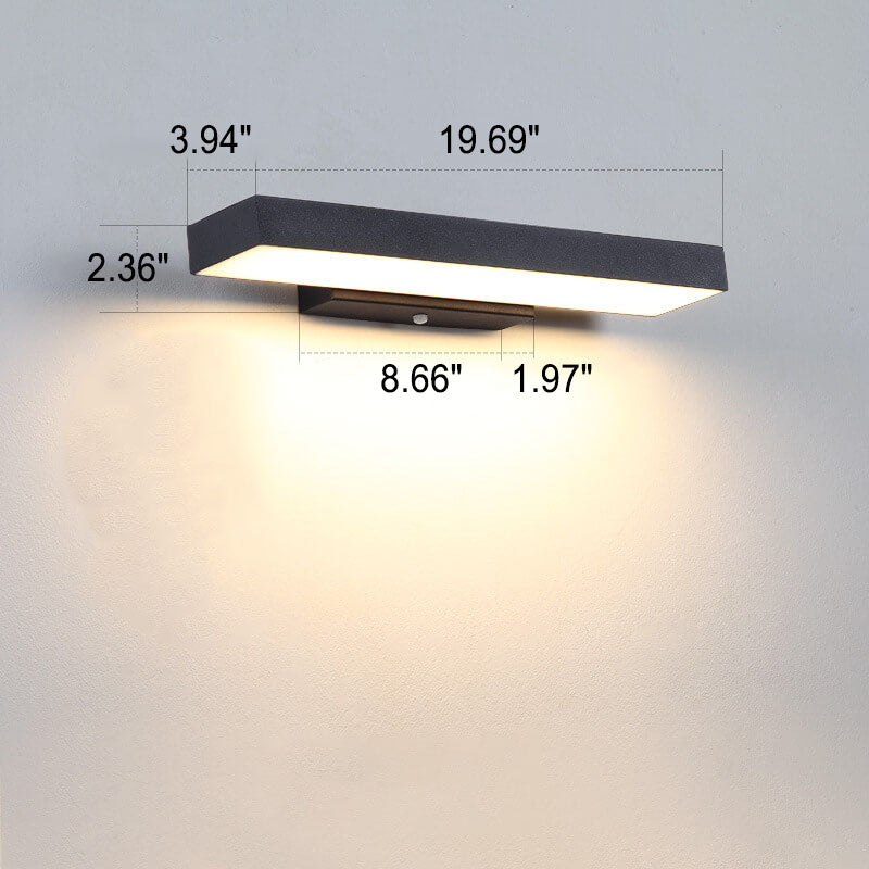 Outdoor wall light on a fence