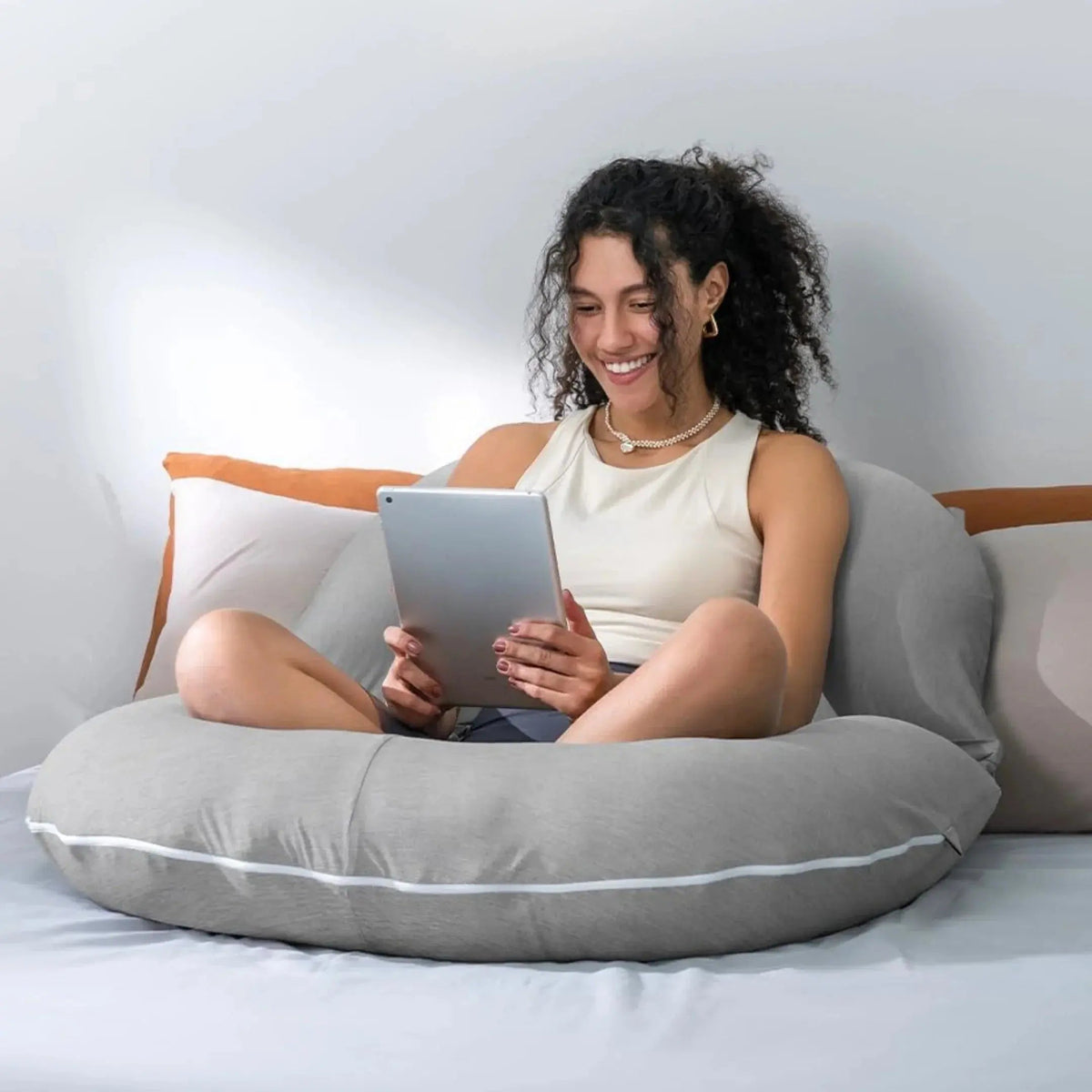 Reading pillow in a bedroom setting