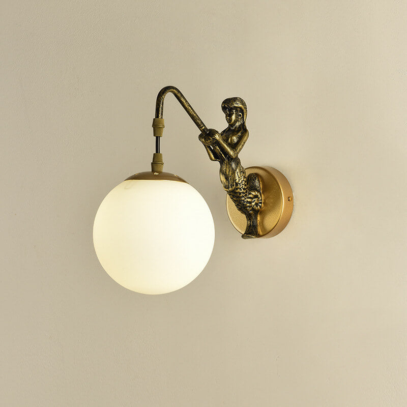 Gold mermaid wall light with white glass orb