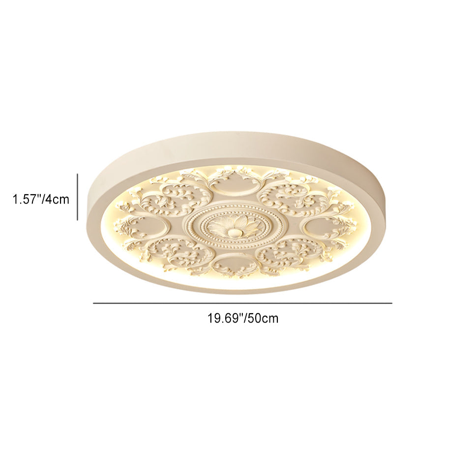 Carved resin flush ceiling light close-up