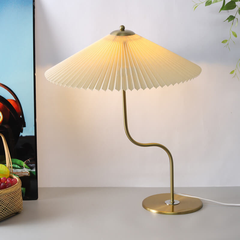Pleated umbrella table lamp lit
