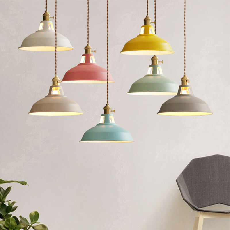 Colourful barn shade pendant lights in a row
