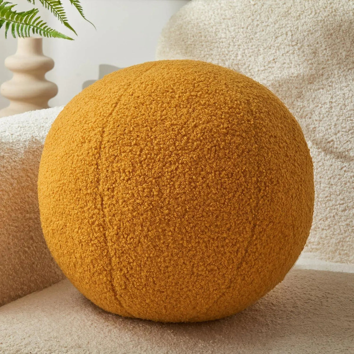 Yellow round ball cushion