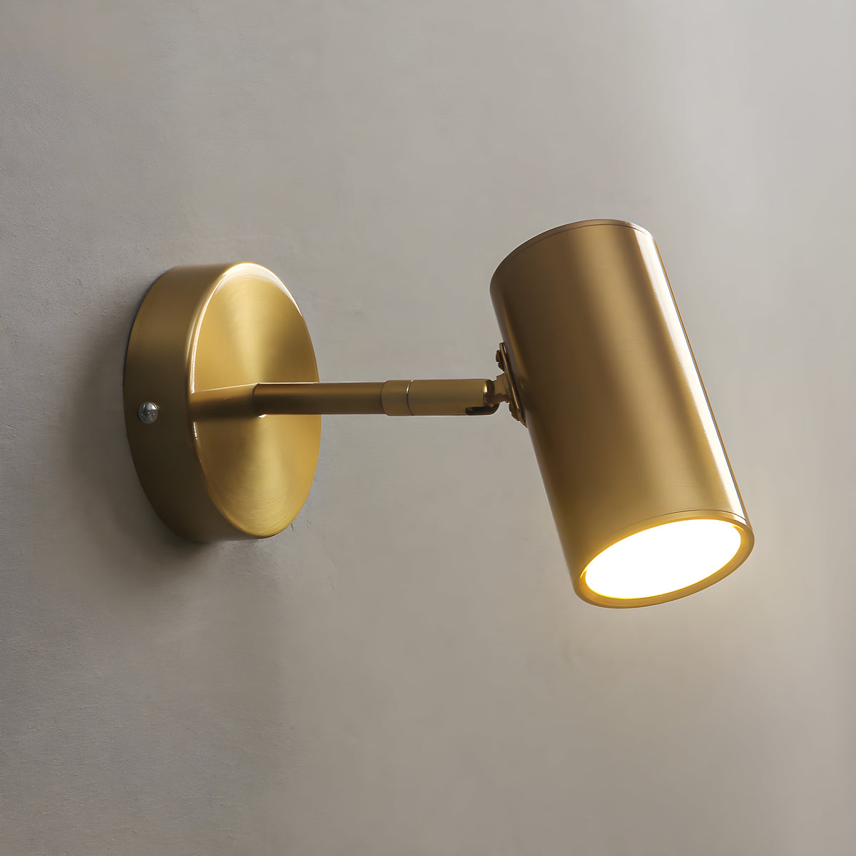 Nordic swing-arm wall light in gold
