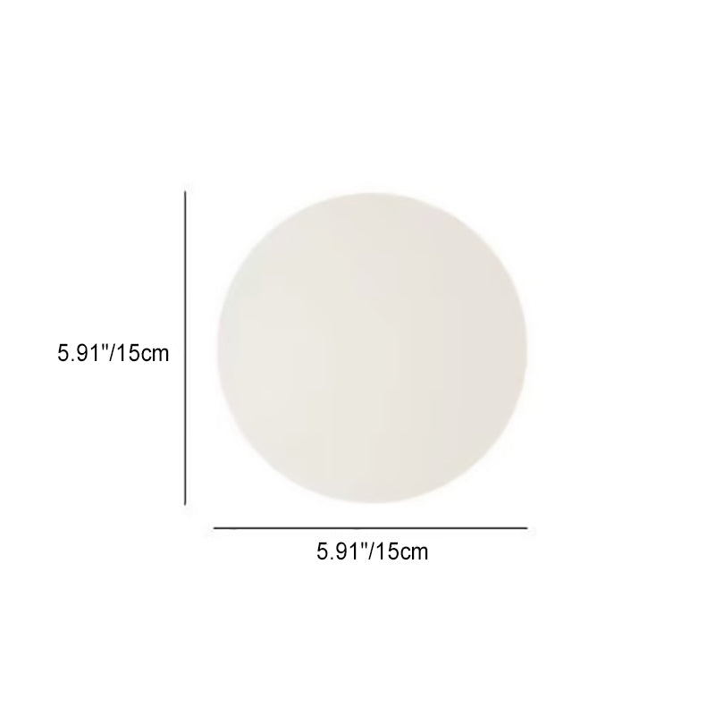 Glass orb wall light lit