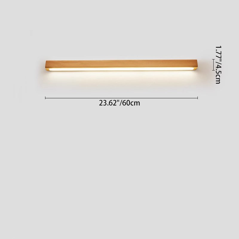 Wood strip LED wall light above mirror